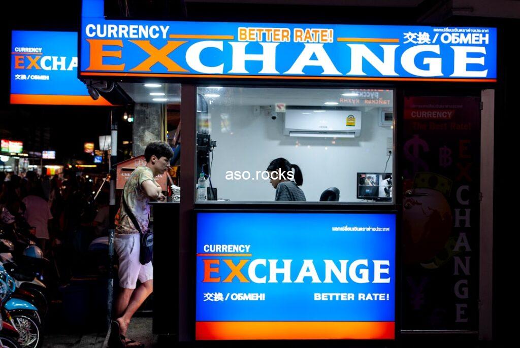 A currency exchange counter showing "Better Rate" signage, representing the parallel market (aboki fx) versus official CBN rates